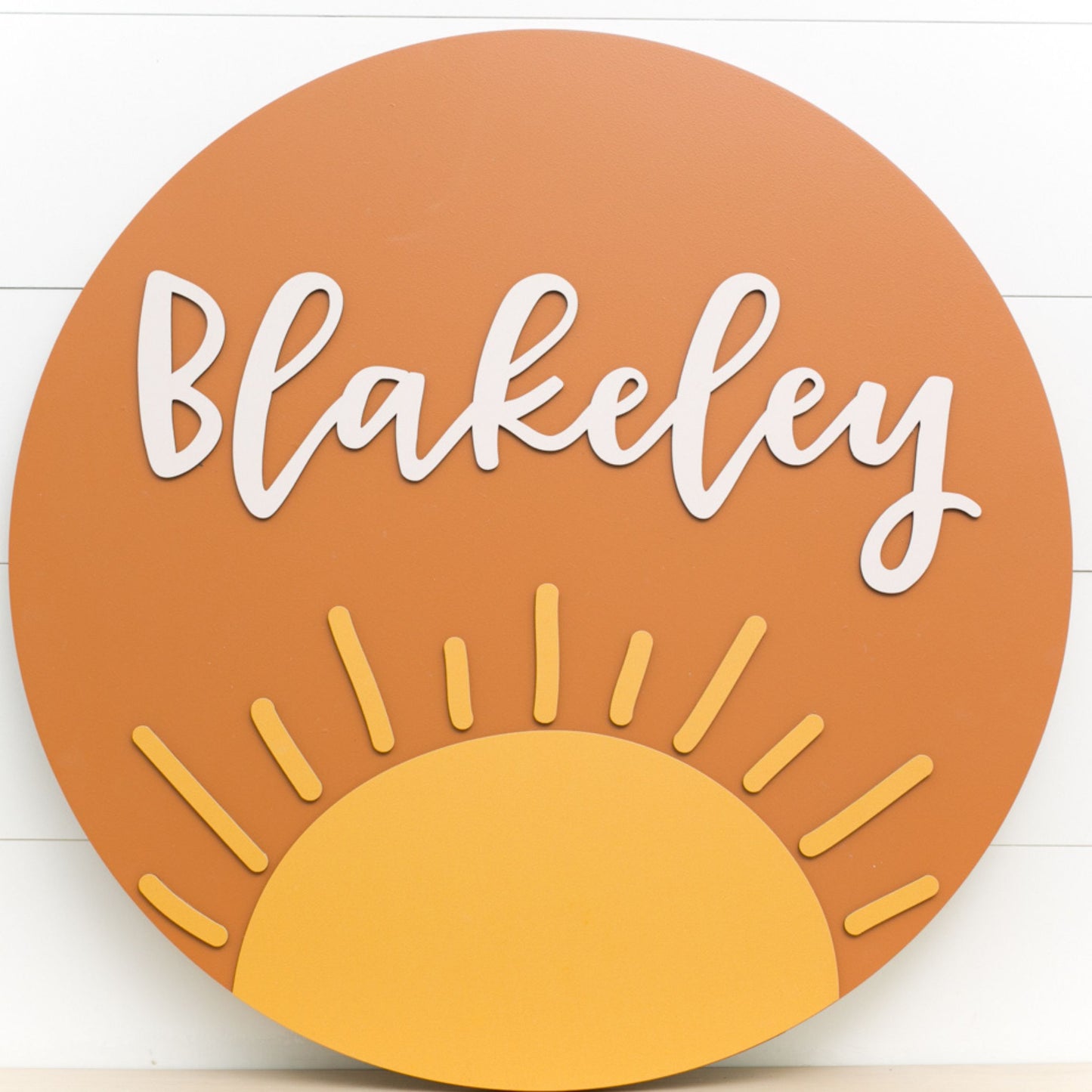 The Blakely Round Wood Sign